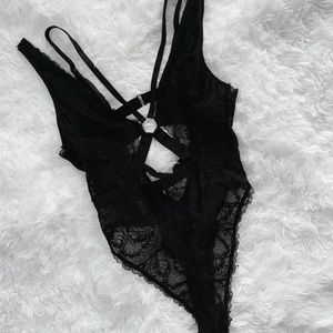 Lacey, strappy Black bodysuit